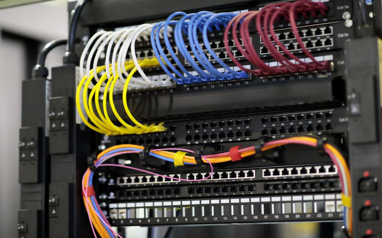 GettyImages-2158025949 Network cables connected to a server rack.